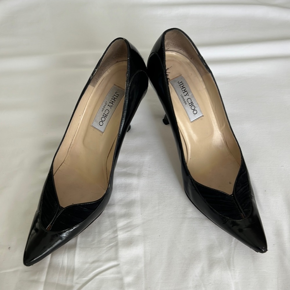 Jimmy Choo black leather pumps/size 38.5